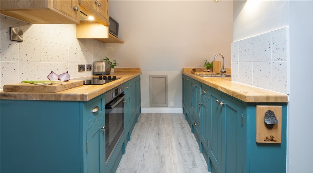 The open-plan kitchen, sitting and dining room (photo 4) at Boatman's Loft in Whitby, North Yorkshire