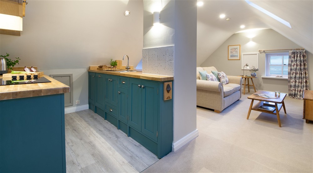 The open-plan kitchen, sitting and dining room (photo 5) at Boatman's Loft in Whitby, North Yorkshire