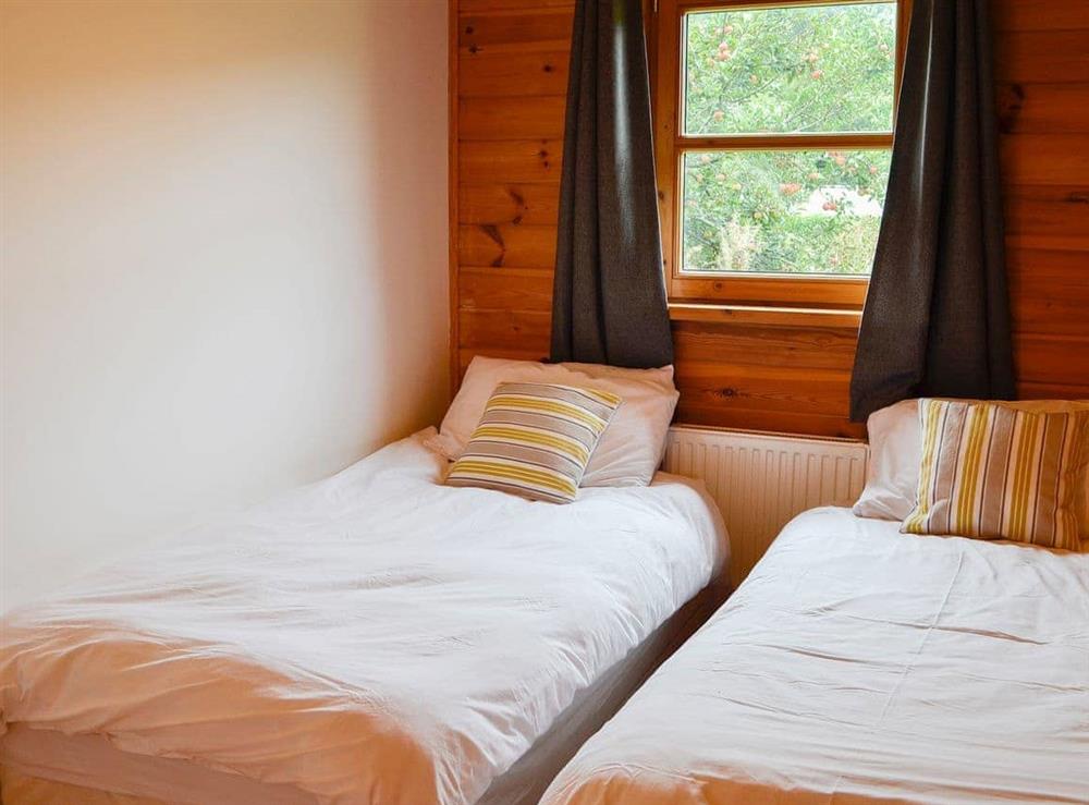 Modest twin bedroom at Edw Lodge, 