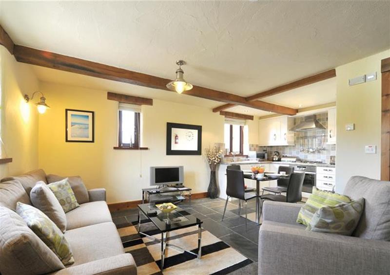 Relax in the living area at Bobbin Cottage, Ings