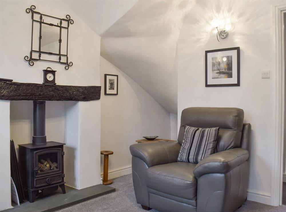 Warm and welcoming living room at Bobbin Cottage in Keswick, Cumbria