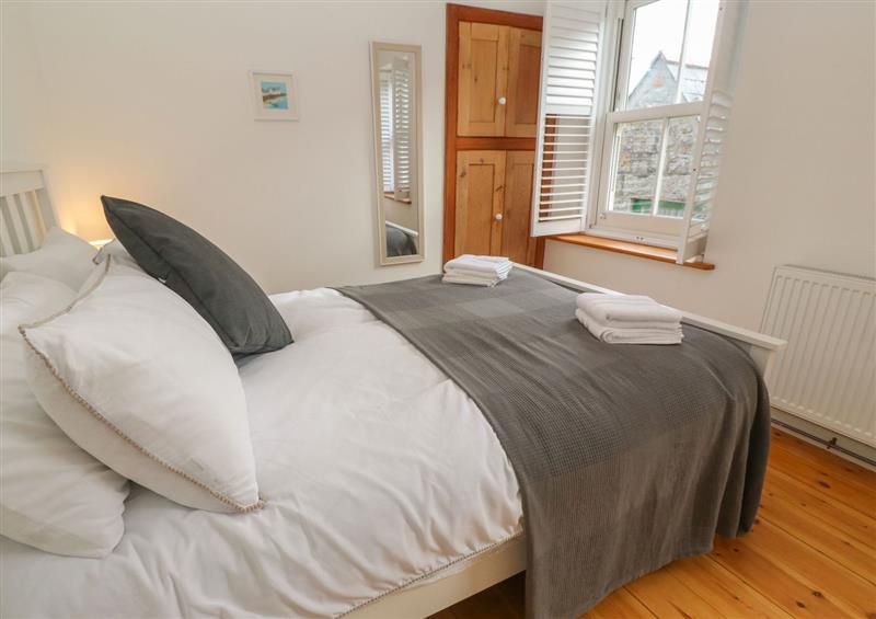 A bedroom in Bodillys Cottage at Bodillys Cottage, Newlyn