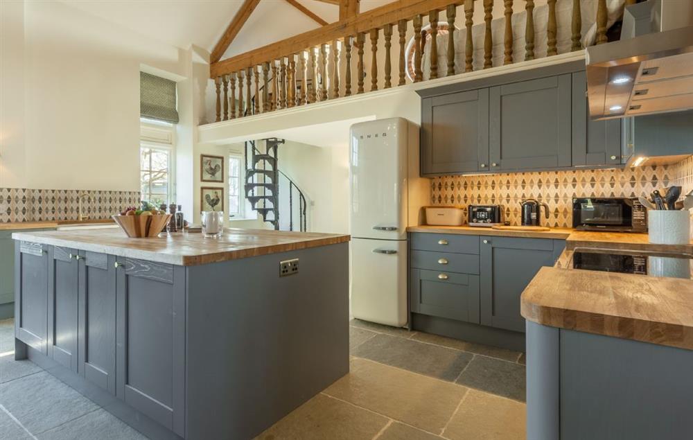 Fully equipped open plan kitchen at Bodney Lodge, Bodney