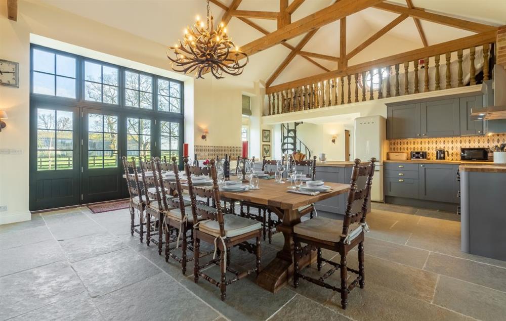 Spacious open plan dining room seating up to twelve guests at Bodney Lodge, Bodney