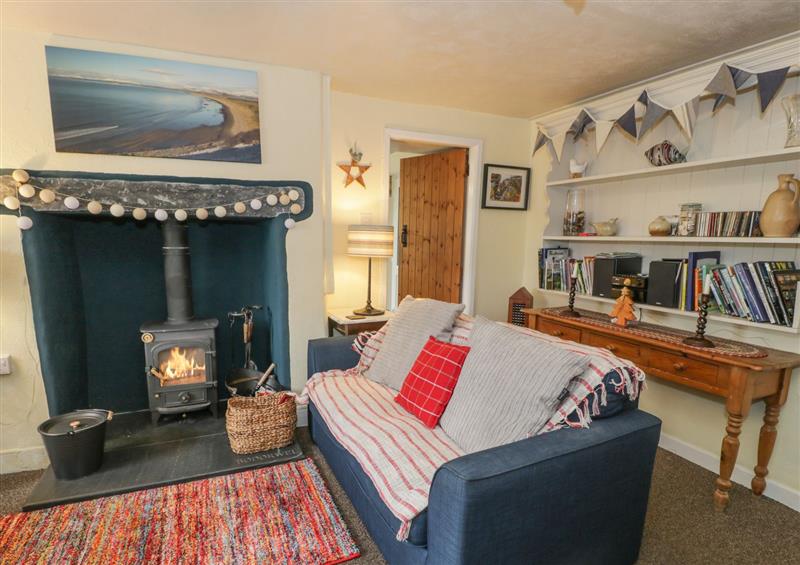 Relax in the living area at Bodorwel Cottage, Penrhyndeudraeth