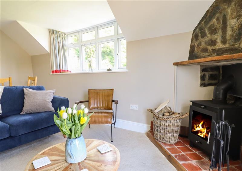 Relax in the living area at Bodowen Coach House, Abermo near Barmouth