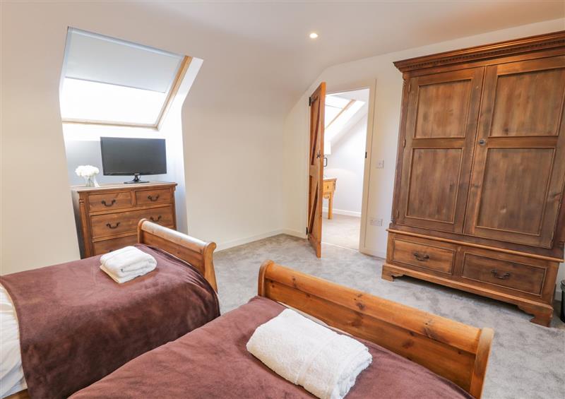 A bedroom in Bodrual Cottage at Bodrual Cottage, Rhosbodrual near Caernarfon