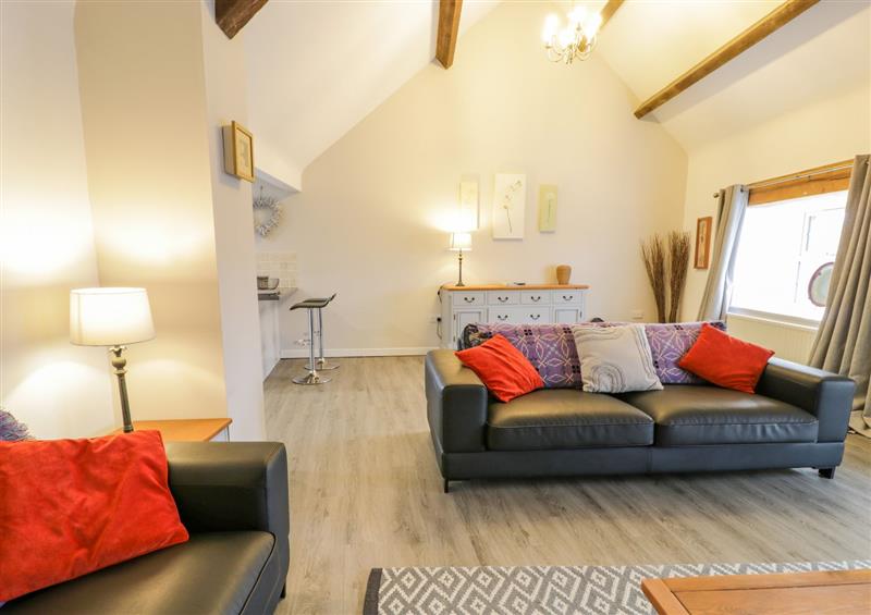 Enjoy the living room at Bodrual Cottage, Rhosbodrual near Caernarfon