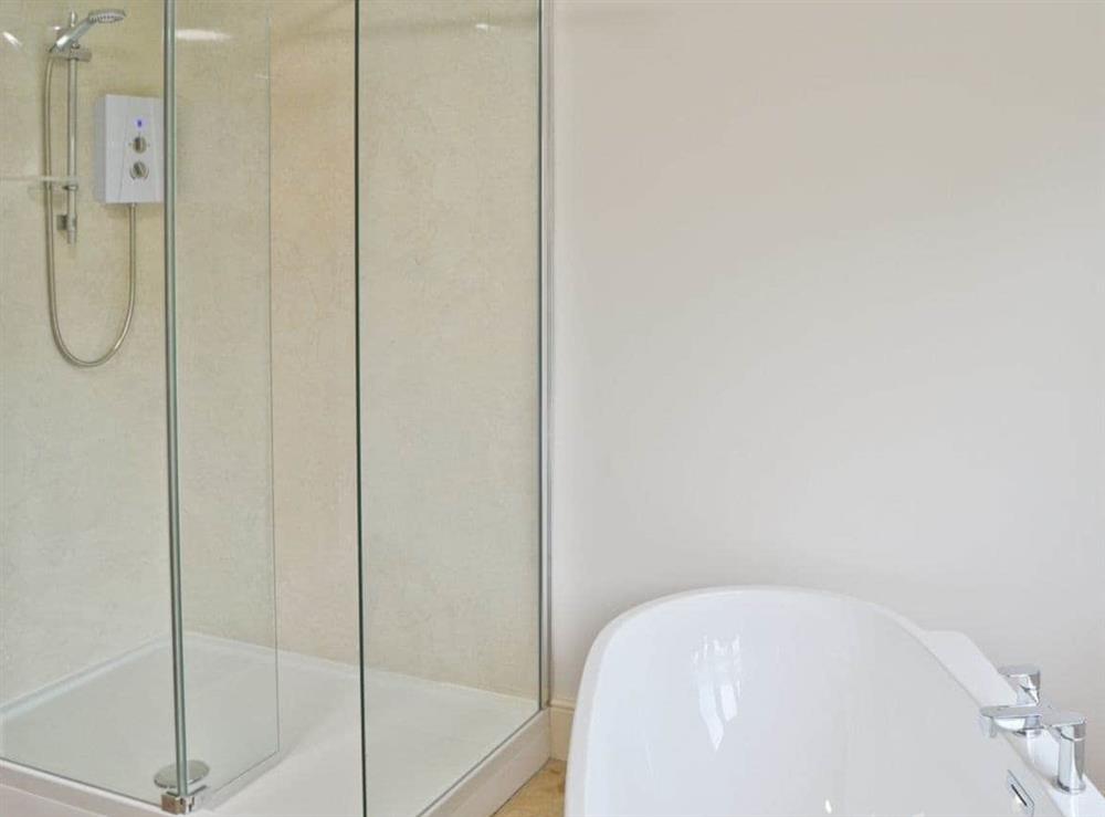 Bathroom with stand-alone bath & separate shower (photo 3) at Bodwen in Wootton Bridge, near Ryde, Isle of Wight