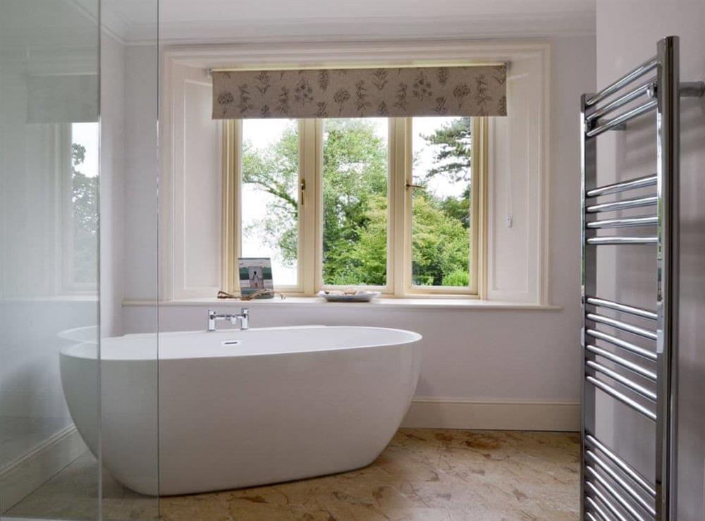 Bathroom with stand-alone bath & separate shower at Bodwen in Wootton Bridge, near Ryde, Isle of Wight