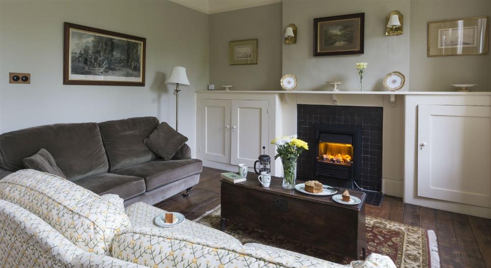 The cosy sitting room at Bog Cottage in Banbury, Oxfordshire