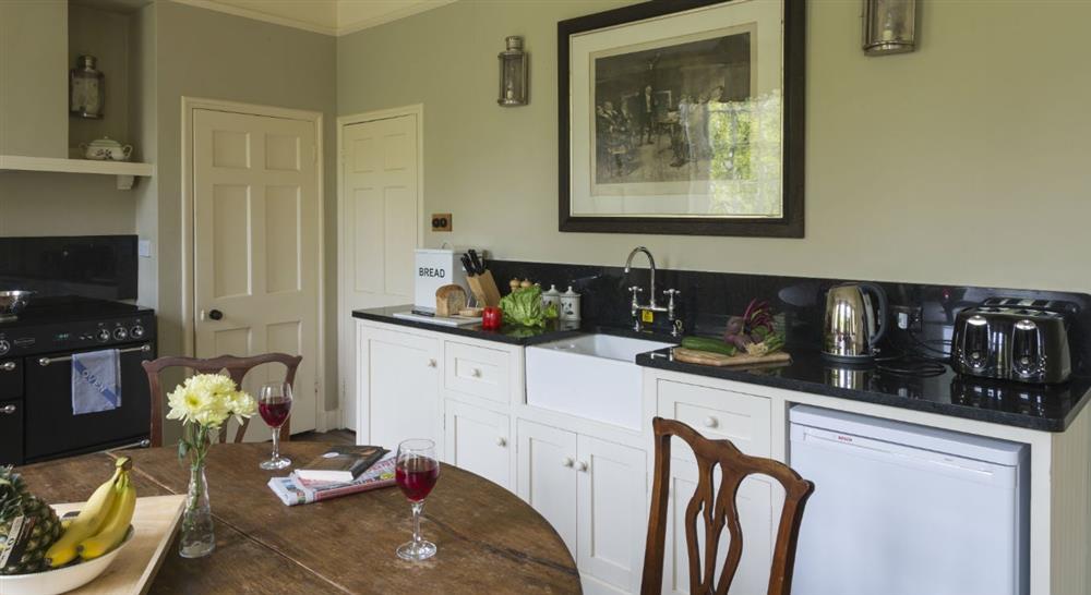 The pleasant kitchen and dining area at Bog Cottage in Banbury, Oxfordshire