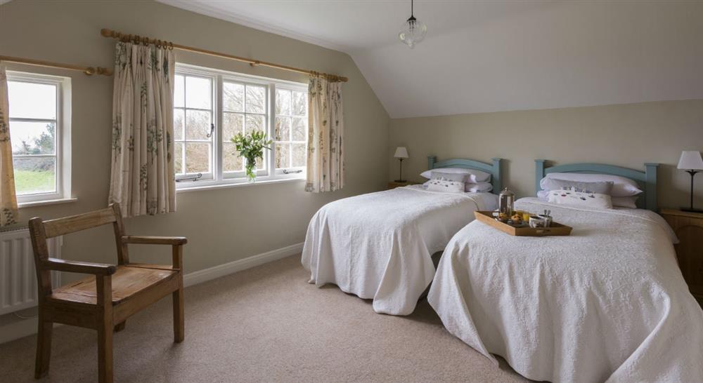 The twin bedroom at Bohurrow Farm Cottage in Roseland, Cornwall