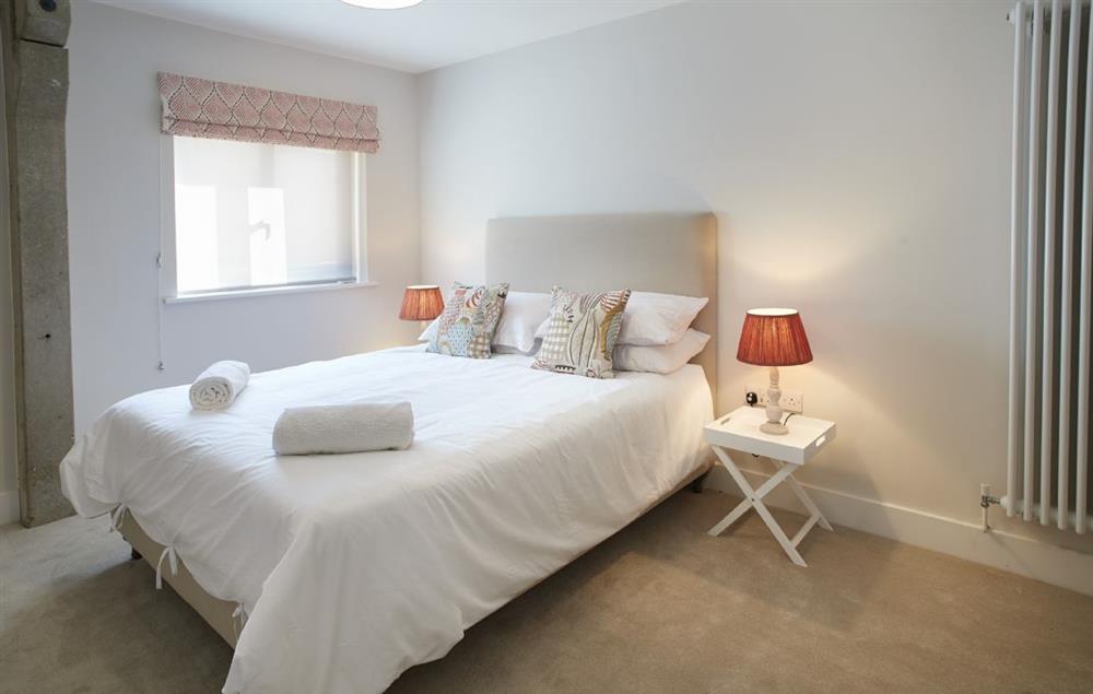 Bedroom five with a king-size bed and en-suite shower room at Bokes Barn, Hawkhurst