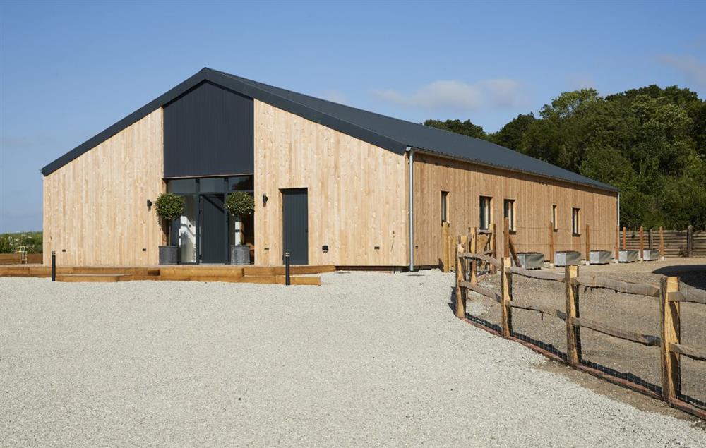 Bokes Barn is a contemporary barn conversion overlooking 80 acres of vineyards, in an Area of Outstanding Natural Beauty