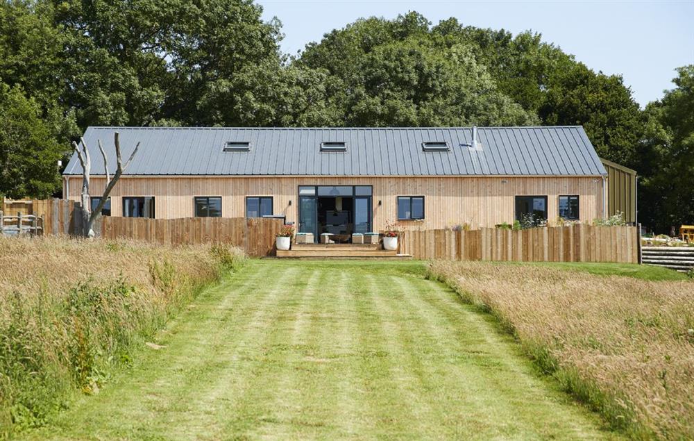 Bokes Barn is a luxurious contemporary barn conversion overlooking 80 acres of vineyards, in an Area of Outstanding Natural Beauty