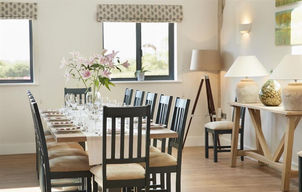 Dining area with seating for 12 guests at Bokes Barn, Hawkhurst