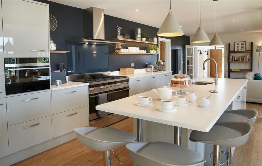 Fully equipped, modern kitchen with island breakfast bar at Bokes Barn, Hawkhurst