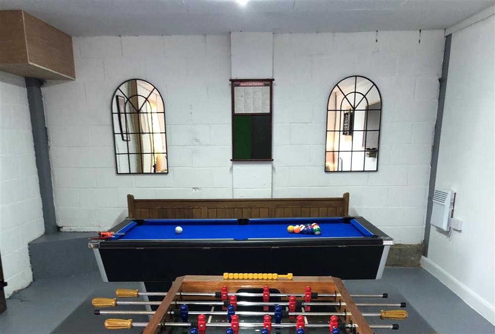 Games room with table football, darts, billiards and table tennis at Bokes Barn, Hawkhurst
