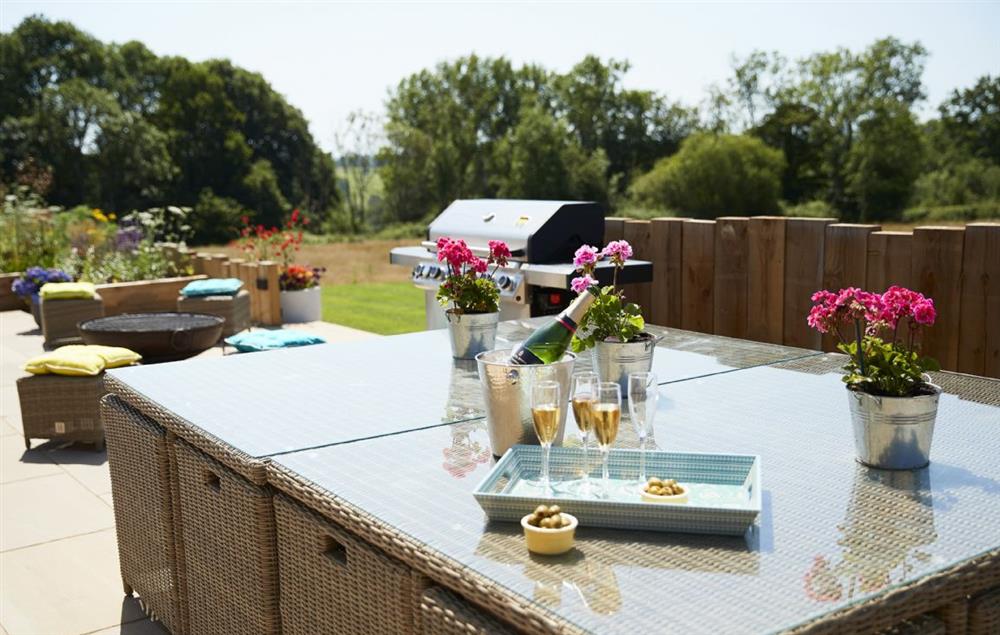 The terrace is ideal for summer barbecues and entertaining at Bokes Barn, Hawkhurst
