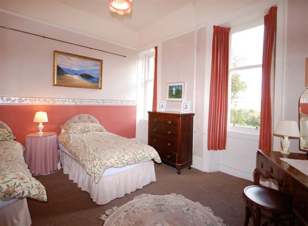 Comfortable twin bedroom at Edwardian Wing, 