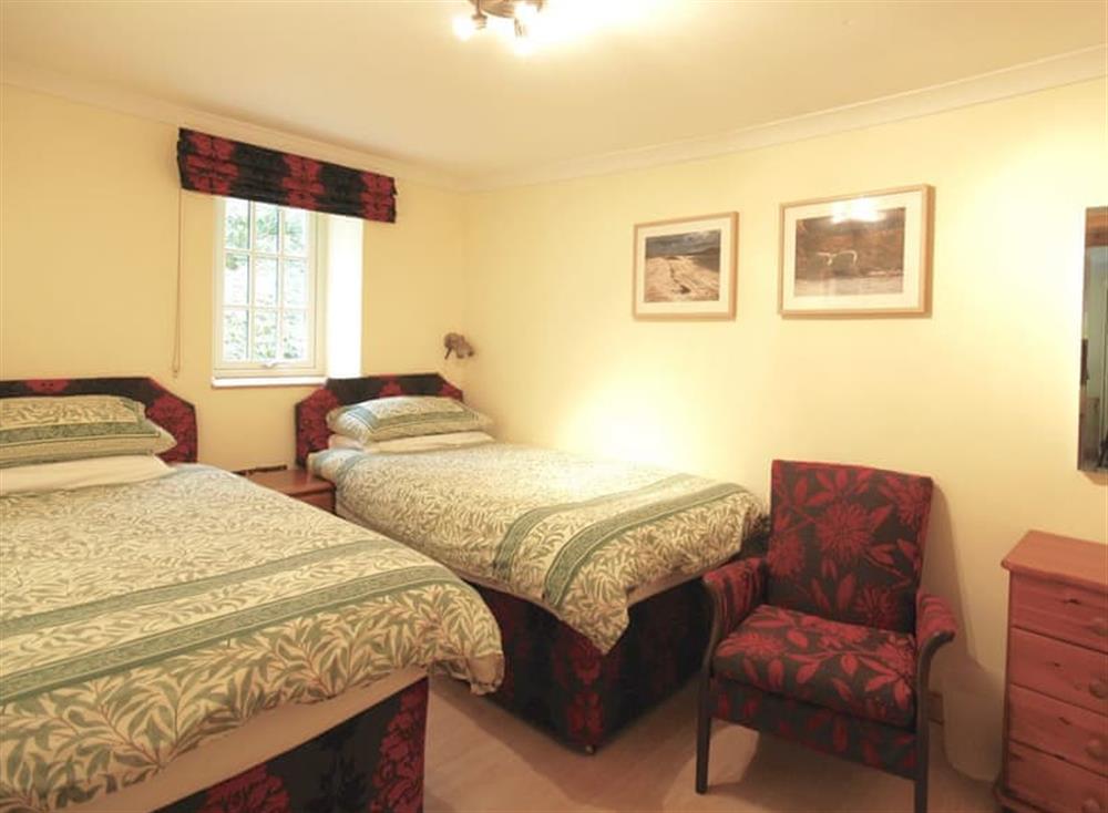 Good-sized twin bedroom at Garden Cottage, 