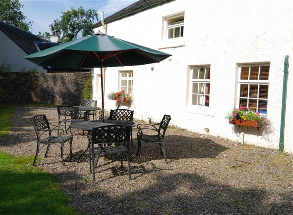 Patio area with outdoor furniture at Garden Cottage, 
