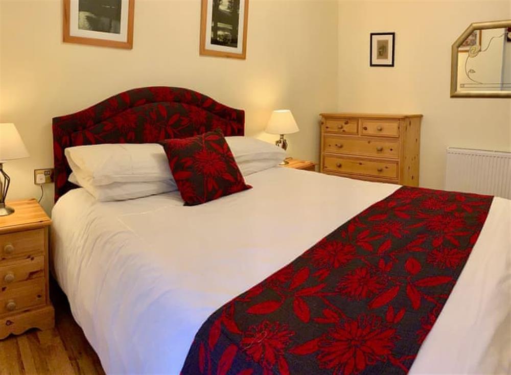 Peaceful double bedroom at Holly Cottage, 