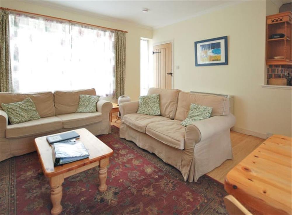 Comfortable seating within living area at Rose Cottage, 