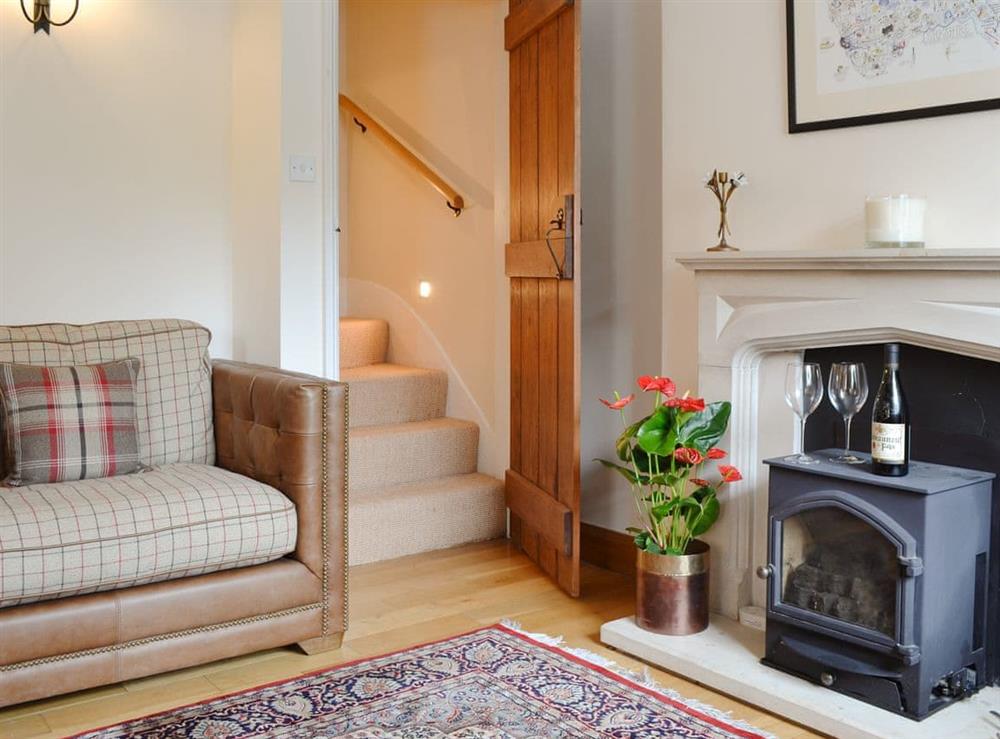 Comfy living room with wood burner at Bondgate in Helmsley, North Yorkshire