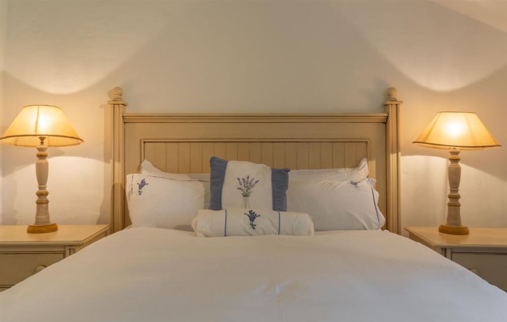 Double bedroom with 5’ king sized bed at Bonython Farmhouse, Helston