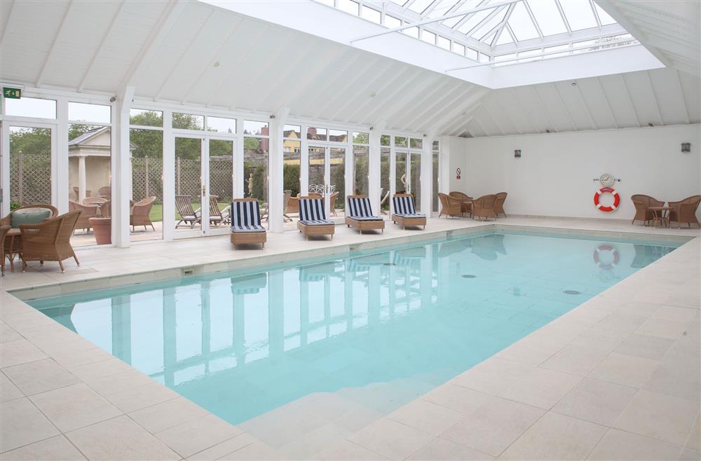 The communal indoor heated swimming pool  at Bookers Cottage, Bruern, near Chipping Norton