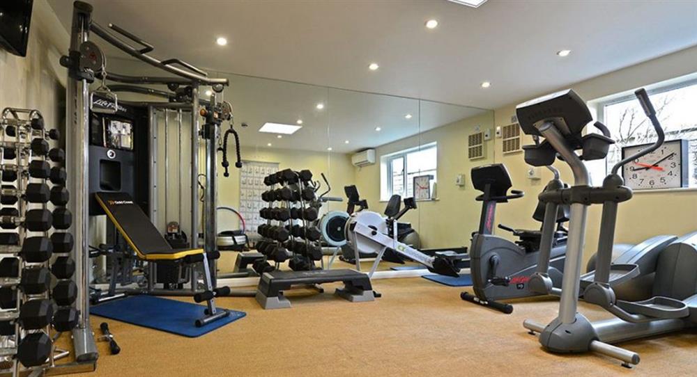 The well-equipped gym  at Bookers Cottage, Bruern, near Chipping Norton