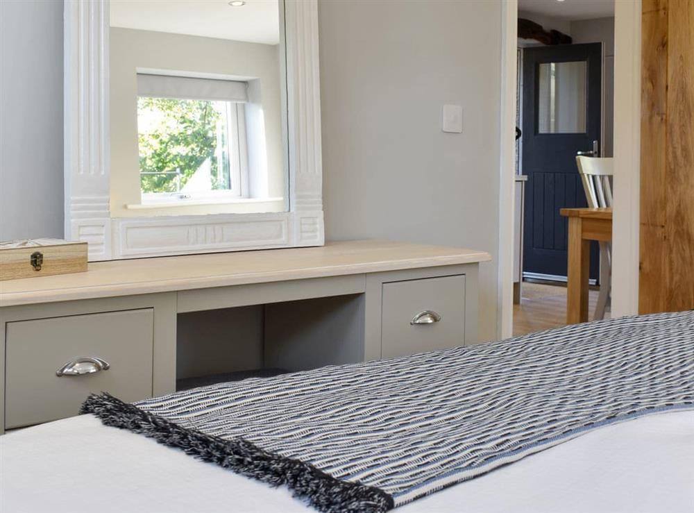 Stylish double bedroom at Threagill Cottage, 