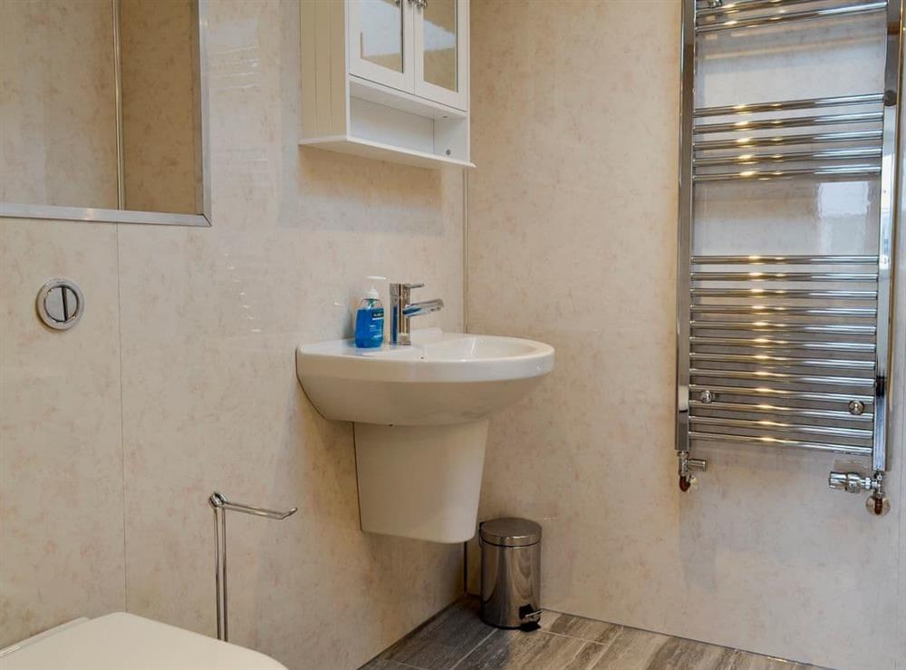 Modern bathroom with bath and shower cubicle (photo 2) at Booth Farm Cottage, 