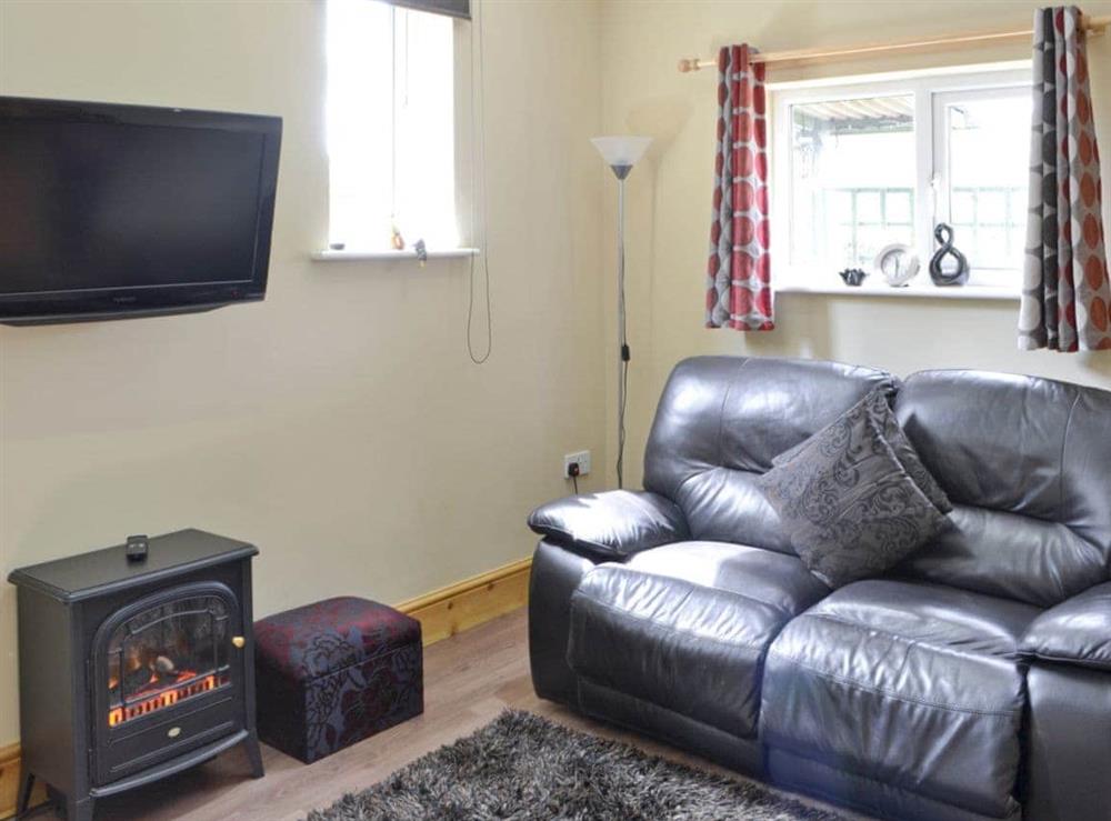 Comfy lounge area at Fir Tree Cottage, 