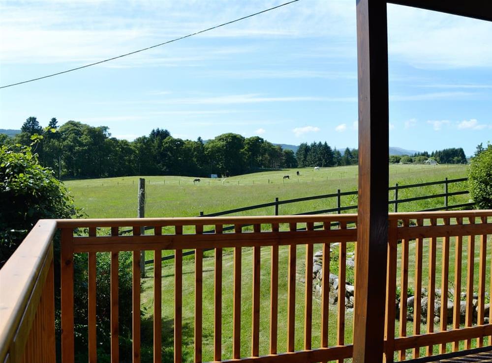 Relaxing veranda with fanastic views (photo 2) at Boreland Farm Cabin, 