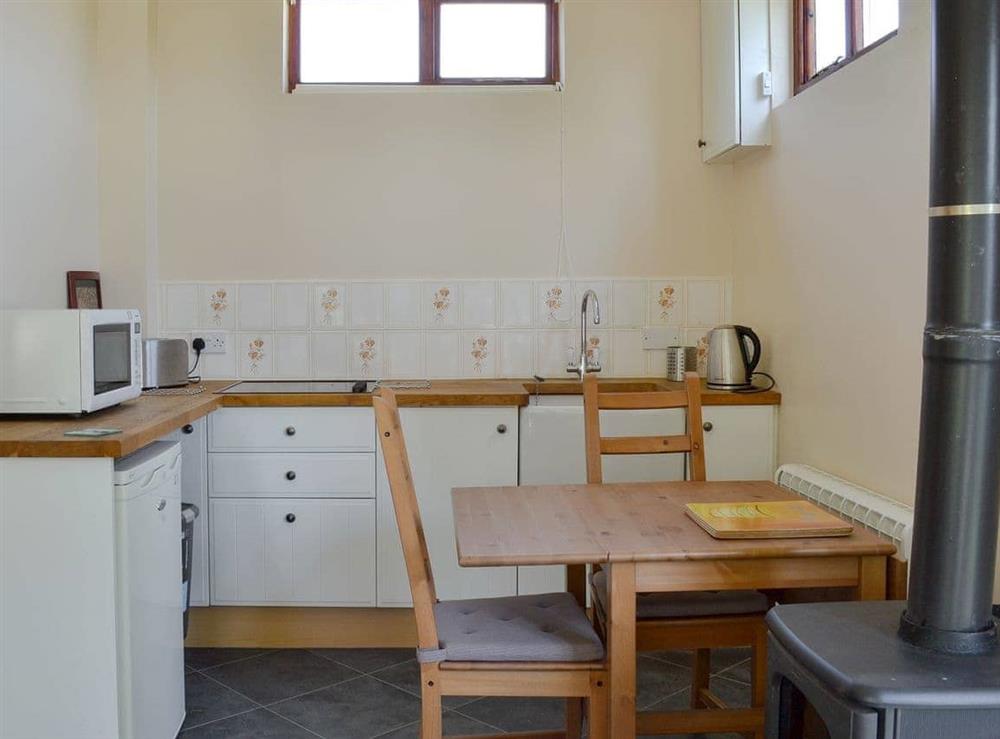 Kitchen/ dining area at Borran Annexe in Oxen Park, near Ulverston, Cumbria