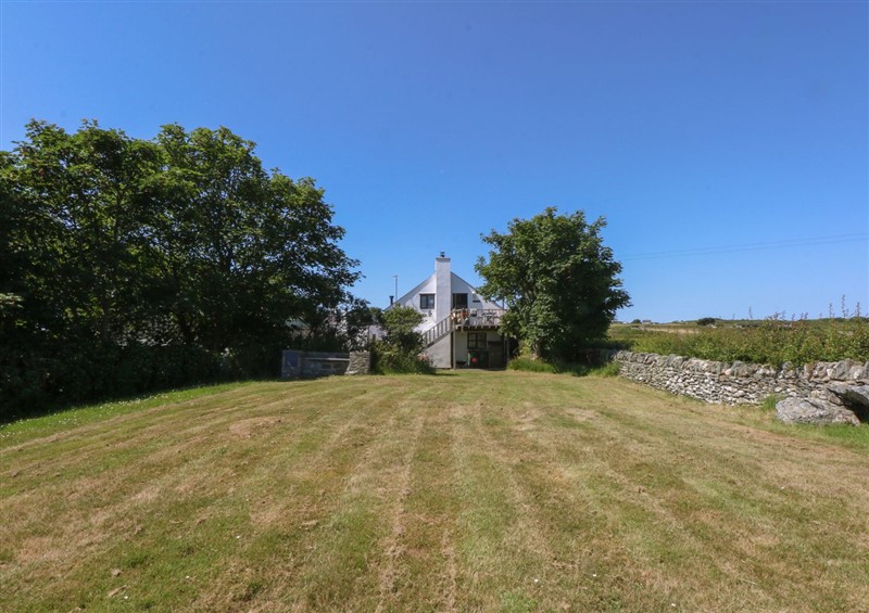 Enjoy the garden at Borth Arian Boat House, Rhoscolyn
