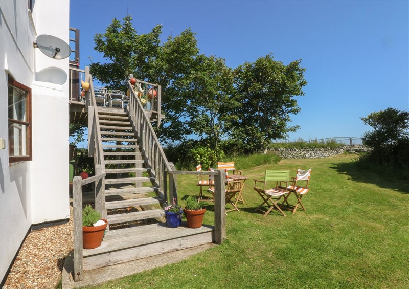 The garden at Borth Arian Boat House, Rhoscolyn