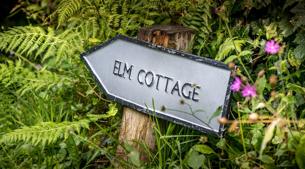 A sign for Boscastle Elm Cottage, Cornwall at Boscastle Elm Cottage in Boscastle, Cornwall