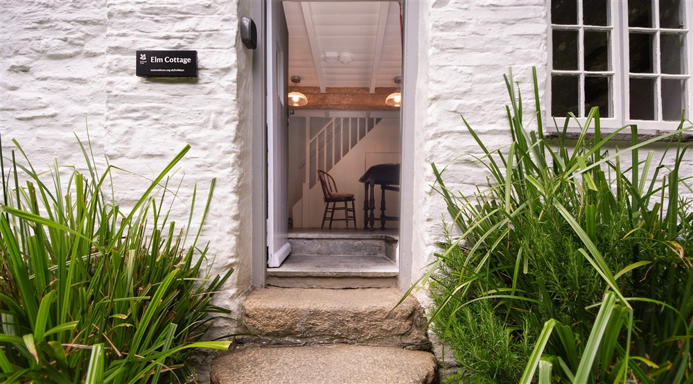 The front door leading into the dining hall at Boscastle Elm Cottage in Boscastle, Cornwall