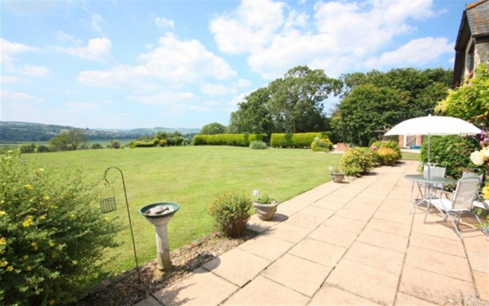 Patio for al fresco dining with stunning views across the Axe Valley at Boshill House in Lyme Regis