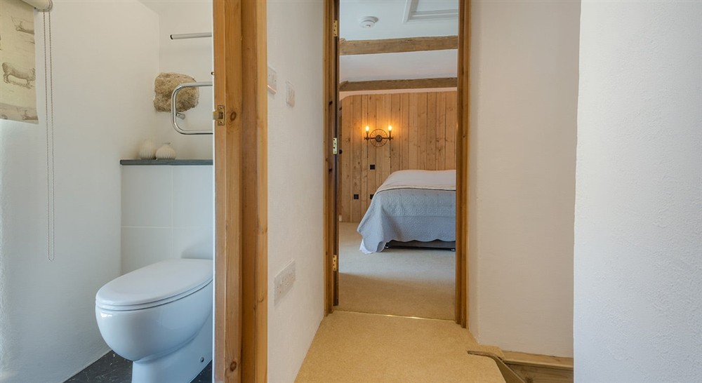 The toilet and hallway on the first floor of Bosigran Cottage, Cornwall at Bosigran Cottage in Penzance, Cornwall