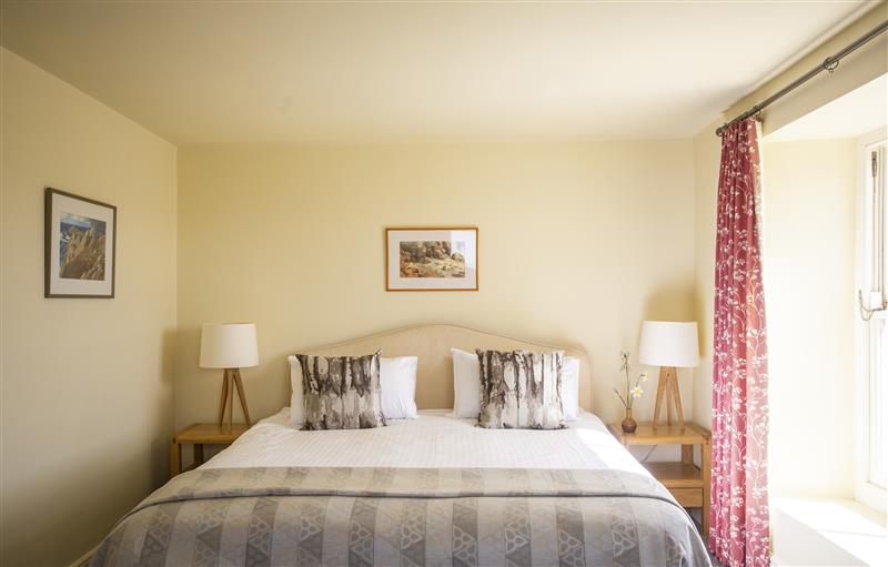 This is a bedroom (photo 2) at Bosistow Farmhouse, St Levan near Porthgwarra