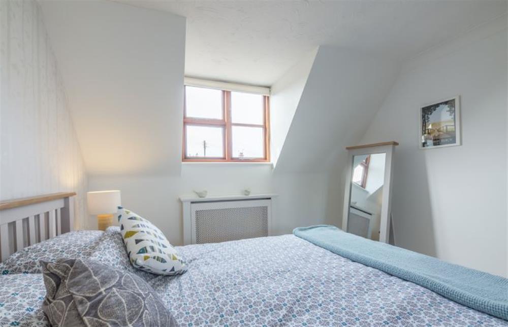 First floor:  Master bedroom with a king-size bed at Bosky House, South Creake  near Fakenham