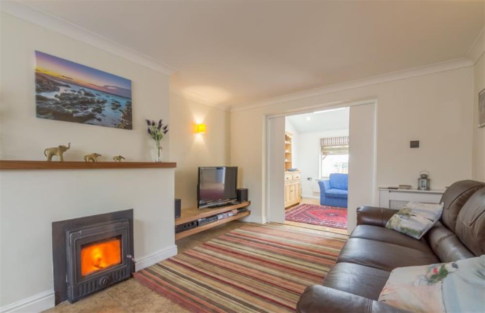 Ground floor:  Sitting room with log burner