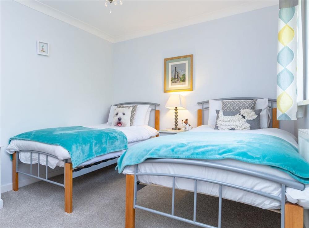Comfortable twin bedroom at Bosula in Fowey, Cornwall