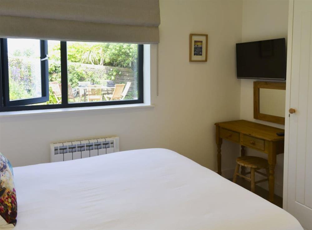 Comfy bedroom with kingsize bed (photo 2) at Bosuns in Port Isaac, near Wadebridge, Cornwall