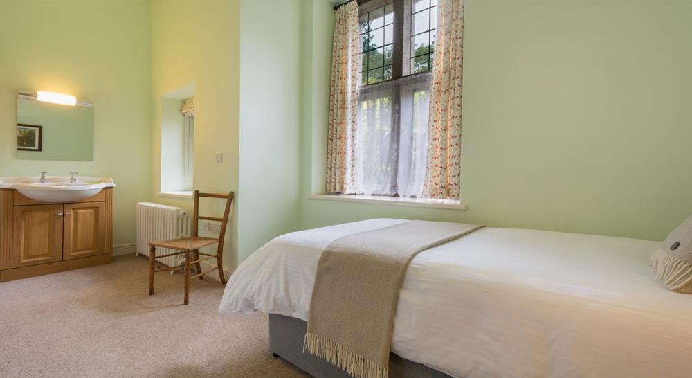 The ground floor single bedroom at Bosveal in Falmouth, Cornwall